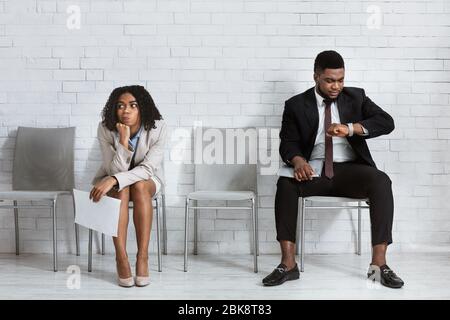 Millennial African American people waiting for job interview in office Stock Photo