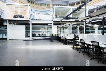 Big rental open space with wrapped computers, no workers Stock Photo