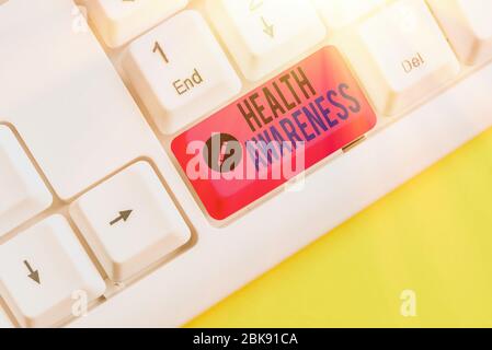 Writing note showing Health Awareness. Business concept for Promoting community issues and preventative action Stock Photo