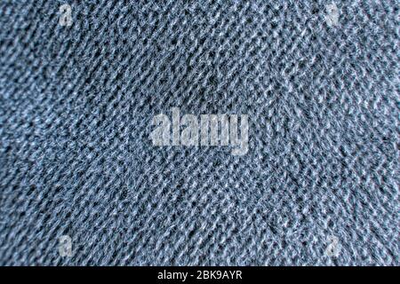 Saturated gray fabric texture. grunge background. pile, hairy threads Stock Photo
