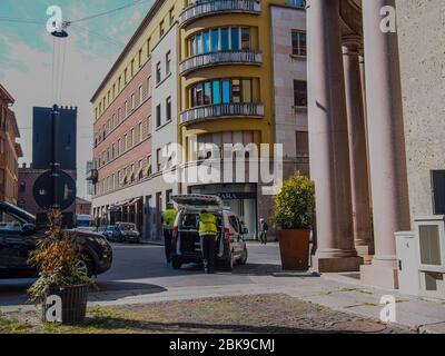 Cremona, Lombardy, Italy -  May 12 nd 2020 - New phase experimenting open air food market in the center of town of Cremona, Lombardy affected covid re Stock Photo