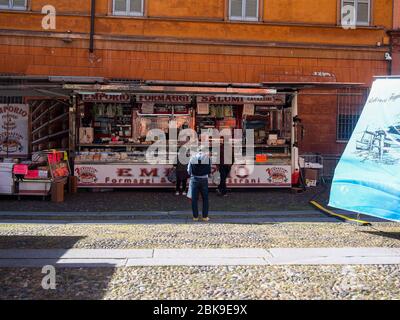 Cremona, Lombardy, Italy -  May 12 nd 2020 - New phase experimenting open air food market in the center of town of Cremona, Lombardy affected covid re Stock Photo