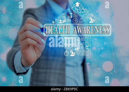 Writing note showing Health Awareness. Business concept for Promoting community issues and preventative action Stock Photo