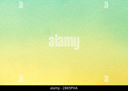 Abstract art background light yellow and green colors. Watercolor painting on canvas with soft turquoise gradient. Fragment of artwork on paper with p Stock Photo