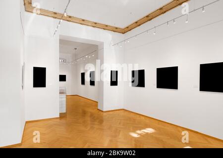 empty gallery room or showroom with blank picture frames Stock Photo