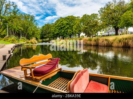 he Avon River running through Hagley Park in Christchurch in New Zealand with a Punt in the foreground Stock Photo