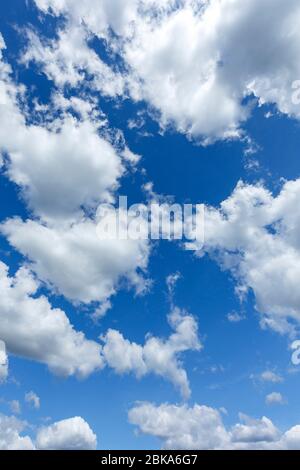 White clouds on a fresh blue background Stock Photo - Alamy