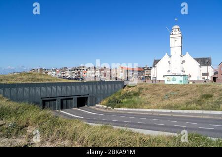 Underground carpark and Andreaskerk (St. Andrew's church) in Katwijk aan Zee, The Netherlands, because of the color also known as Witte Kerk (white ch Stock Photo