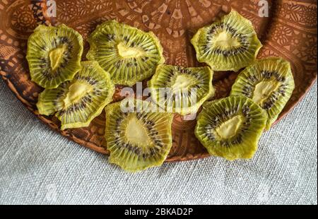 Sweet pure fruit pastille. Natural sweets from dried berries and fruits. Useful sweetness is pastille, fruit chips. Dietary vitamin nutrition. Vegan F Stock Photo