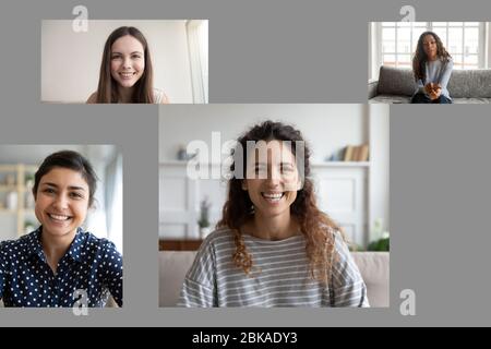 Diverse female have online training on webcam together Stock Photo