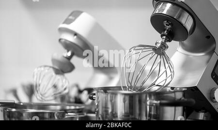 https://l450v.alamy.com/450v/2bkaf0c/professional-steel-electric-mixer-for-kneading-dough-cream-in-restaurant-kitchen-2bkaf0c.jpg