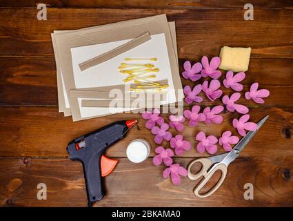 Child makes Mother's Day or Birthday greeting card. DIY Step 5 of 7 Stock Photo