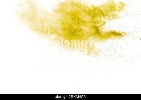 Green yellow dust splash.Green yellow color powder explosion cloud on white background. Stock Photo