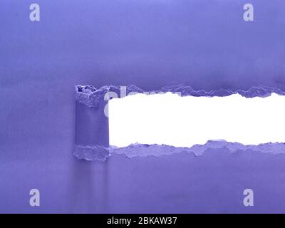 Torn Paper revealing blank space for message Stock Photo