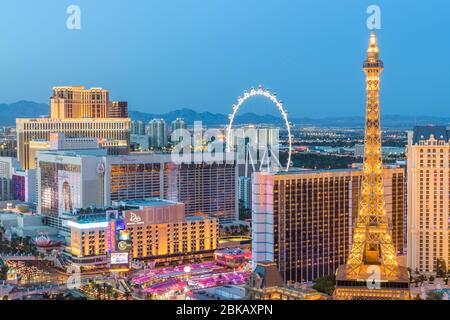 LAS VEGAS, NEVADA - APRIL 18, 2018: Hotels and Casinos along the strip at dusk. Stock Photo