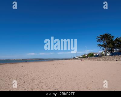 INSTOW, NORTH DEVON, ENGLAND - MAY 2 2020: Instow sands, virtually deserted in the sunshine due to Coronavirus, Covid 19 lockdown. Tourism problem. Stock Photo