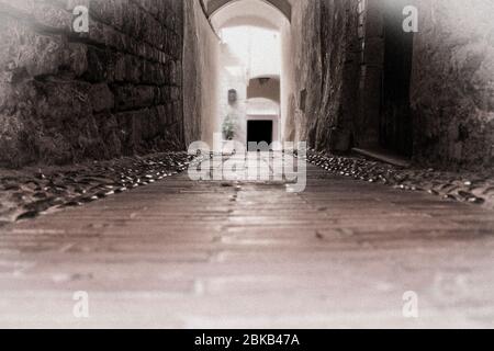 image taken from below of a typical alley of deer very ancient country located on the ligurian sea in italy Stock Photo