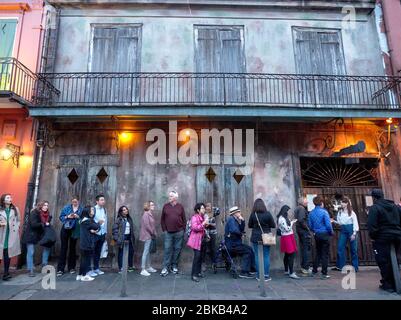 New Orleans, Louisiana, USA - 2020: People wait in line before a live performance by the Preservation Hall Jazz Band at the famous Preservation Hall. Stock Photo