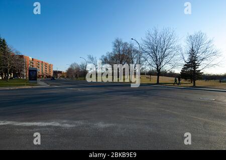 MONTREAL, CANADA - APRIL 28, 2020: During Covid19 lockdown, Boulevard Rosemont clearly shows the impact of the pandemic on the traffic on one of the m Stock Photo