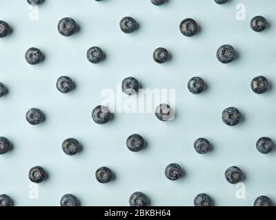 blueberry pattern on blue background, top view Stock Photo
