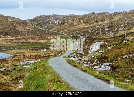 Single track road to Hushinish on the west coast of the Isle of Harris, Outer Hebrides, Scotland. Stock Photo