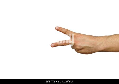 Hand with the symbol of scissors, two fingers forward on a white background isolated Stock Photo