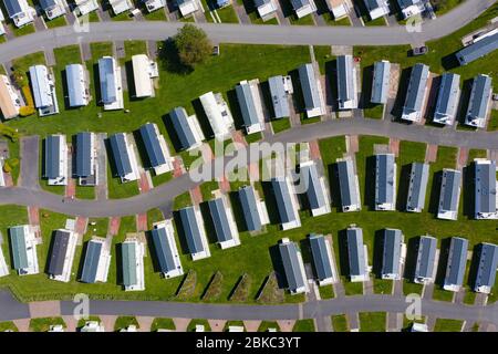 Ayr, Scotland, UK. 4 May 2020. Aerial view of caravans at Craig Tara Caravan Holiday Park, south of Ayr. The holiday park is closed during the coronavirus lockdown and caravans remain empty on what would be be a busy weekend. The park is on what was formerly the Ayr Butlins holiday park. Iain Masterton/Alamy Live News Stock Photo