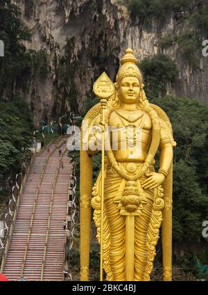 huge gold statue in Batu caves, Malaysia Stock Photo