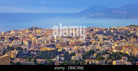 French riviera. Town of Cannes. Panoramic view of Cannes cityscape and seafront from hill, Alpes-Maritimes department of France Stock Photo