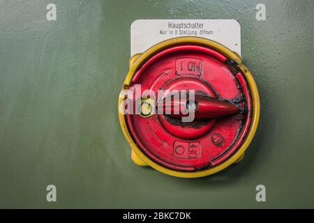 mains switch of a historic machine Stock Photo