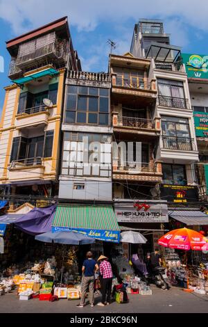 Residential housing and shops arund Dong Xuan market, Hang Khoai street, Hoan Kiem, old quarter, Hanoi, Vietnam Stock Photo