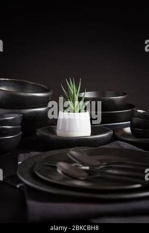 Dishes in minimalistic black design. Pure black. Stock Photo