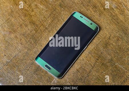 Smartphone on a desk Stock Photo