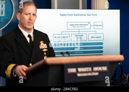 Logistics specialist Rear Admiral John Polowczyk explains a supply chain diagram as he addresses reporters at the coronavirus (COVID-19) update briefing Monday, March 23, 2020, in the James S. Brady Press Briefing Room of the White House. White House Press Briefing Stock Photo