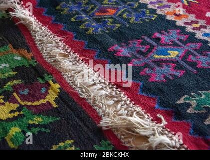 Bosnia and Herzegovina, Mostar - June 2018: Hand woven colouful carpets Stock Photo