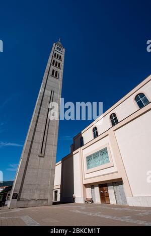 Bosnia and Herzegovina, Mostar - June 2018: Mostar Peace Bell Tower is a newly built tower, next to a new church, in the Croatian part of Mostar Stock Photo