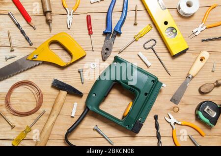 Various tools on wooden background Stock Photo