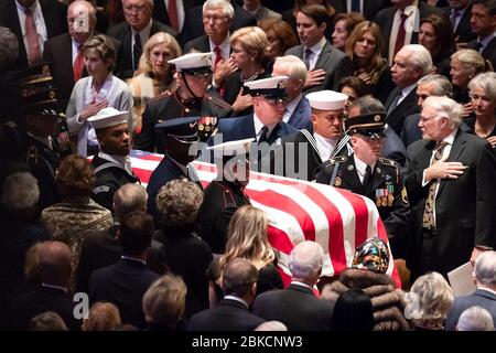 The casket of former President George H. W. Bush arrives to the funeral service at the Washington National Cathedral Wednesday, Dec. 5, 2018, in Washington, D.C. The Funeral of President George H.W. Bush Stock Photo