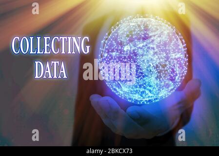 Handwriting text Collecting Data. Conceptual photo Gathering and measuring information on variables of interest Elements of this image furnished by NA Stock Photo