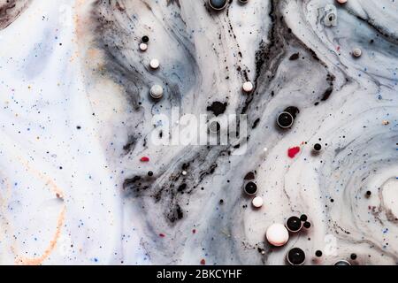 Bright colorful acrylic paint. Macro structure of Multicolored Bubbles Paint and Oil. Stock Photo