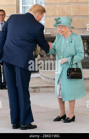 President Donald J. Trump greets Britain’s Queen Elizabeth II during a welcoming ceremony at Buckingham Palace Monday, June 3, 2019, in London. President Trump and First Lady Melania Trump's Trip to England Stock Photo