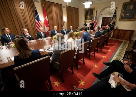 President Donald J. Trump, joined by Vice President Mike Pence, participates in an expanded bilateral working luncheon with Canadian Prime Minister Justin Trudeau Thursday, June 20, 2019, in the Cabinet Room of the White House. President Trump Meets with the Prime Minister of Canada Stock Photo