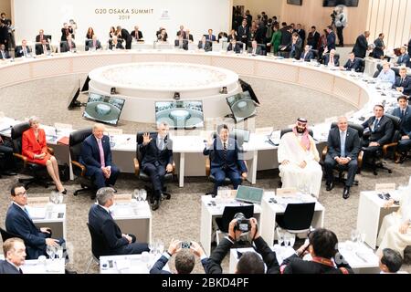 President Donald J. Trump participates in the official welcome ceremony and poses for a family photo with other G20 leaders at the G20 Summit in Osaka, Japan, on June 28, 2019. Stock Photo