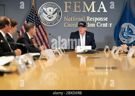 President Donald J. Trump, joined by Acting Secretary of the Department of Homeland Security Kevin McAleenan and Acting FEMA Administrator Pete Gaynor, attends a briefing Sunday, Sept. 1, 2019, on the current directional forecast of Hurricane Dorian at the Federal Emergency Management Agency (FEMA) headquarters in Washington, D.C. President Trump at FEMA Stock Photo