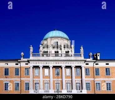 Carciotti Palace (Palazzo Carciotti) neoclassical architecture. Building facade with columns, elegant balcony with statues. Trieste, Italy, Europe, EU Stock Photo