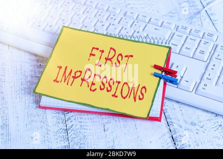 Writing note showing First Impressions. Business concept for What an ...