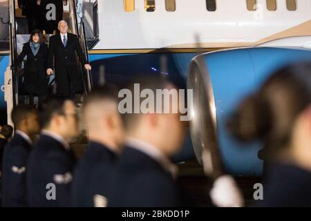 Vice President Mike Pence and Mrs. Karen Pence disembark Air Force Two at Yokota Air Base, Tuesday, February 6, 2018, and are greeted by U.S. Ambassador to Japan, Bill Hagerty and his wife Chrissy Hagerty, Masahisa Sato, Japanese State Minister for Foreign Affairs, Lt Gen. Jerry Martinez, Commander of the U.S. Force of Japan and his wife Kim Martinez and Col. Kenneth Moss, Commander of Yokota Air Base and his wife Molly Moss, in Tokyo, Japan. Vice President Pence's Trip to Asia Stock Photo