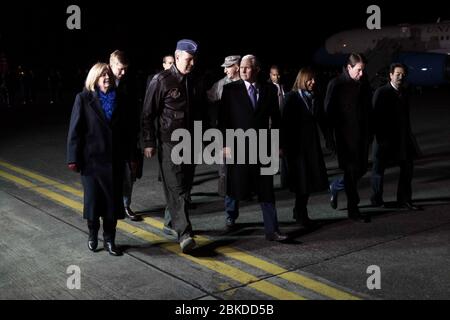 Vice President Mike Pence and Mrs. Karen Pence disembark Air Force Two at Yokota Air Base, Tuesday, February 6, 2018, and are greeted by U.S. Ambassador to Japan, Bill Hagerty and his wife Chrissy Hagerty, Masahisa Sato, Japanese State Minister for foreign affairs, Lt Gen. Jerry Martinez, Commander of the U.S. Force of Japan and his wife Kim Martinez and Col. Kenneth Moss, Commander of Yokota Air Base and his wife Molly Moss, in Tokyo, Japan. Vice President Pence's Trip to Asia Stock Photo