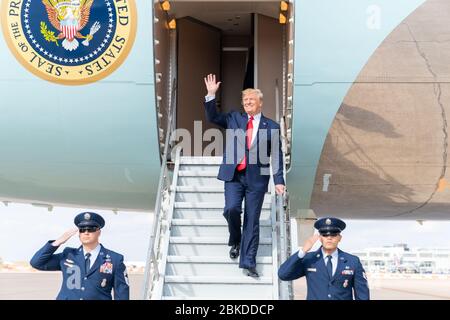 President Donald J. Trump disembarks Air Force One at Austin-Bergstrom International Airport in Austin, Texas Wednesday, Nov. 20, 2019, where he was greeted by Texas Lt. Gov. Dan Patrick and Texas Attorney General Ken Paxton. President Trump Departs for Texas Stock Photo