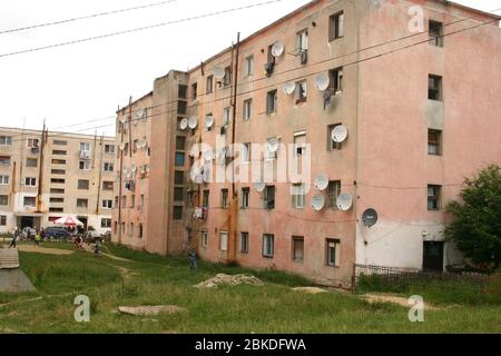 Communist -era apartment buildings for factory workers and their families in Zarnesti, Romania Stock Photo